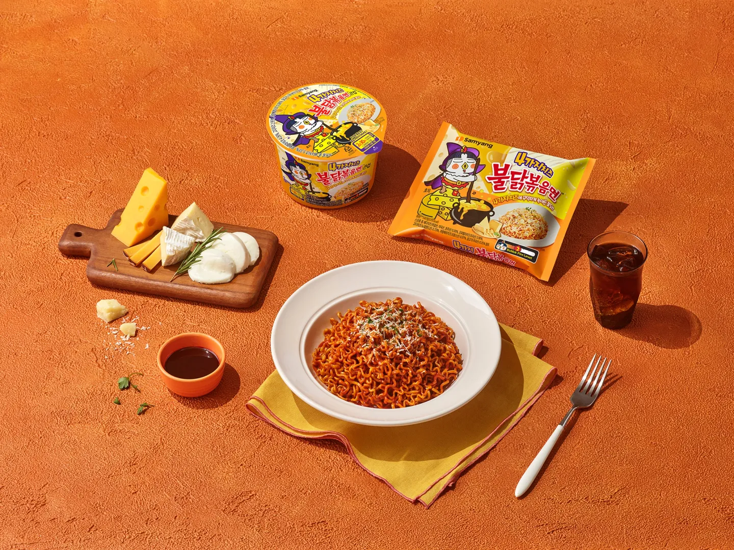 Quattro Cheese Buldak with a Rich Cheese Flavor, Packed with Gouda, Cheddar, Camembert, and Mozzarella Cheeses.