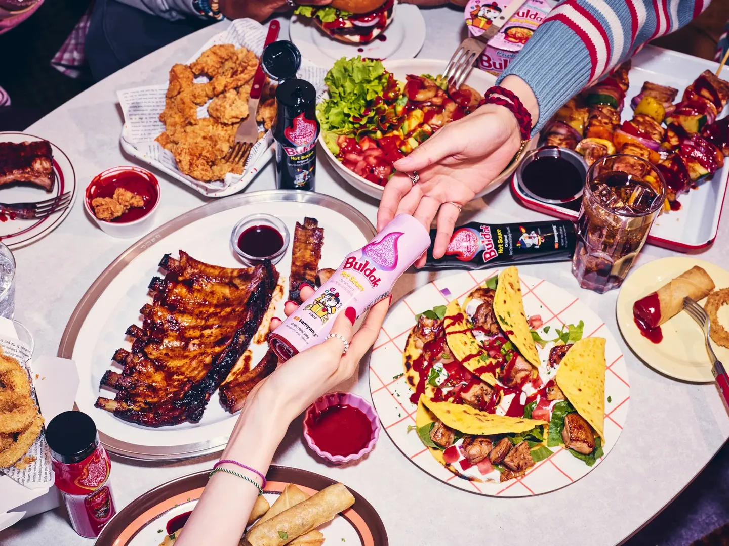 Tomato Pasta Buldak - A fusion pasta combining Buldak's fiery heat with the tangy flavor of tomato pasta.