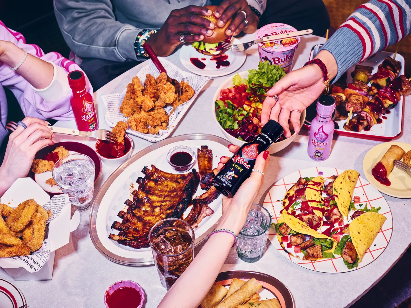 Tomato Pasta Buldak - A fusion pasta combining Buldak's fiery heat with the tangy flavor of tomato pasta.